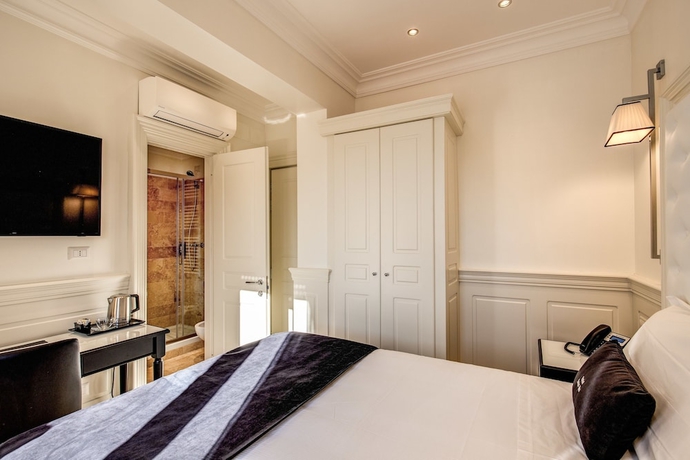 Imagen de la habitación del Hotel Domus Mea. Foto 12