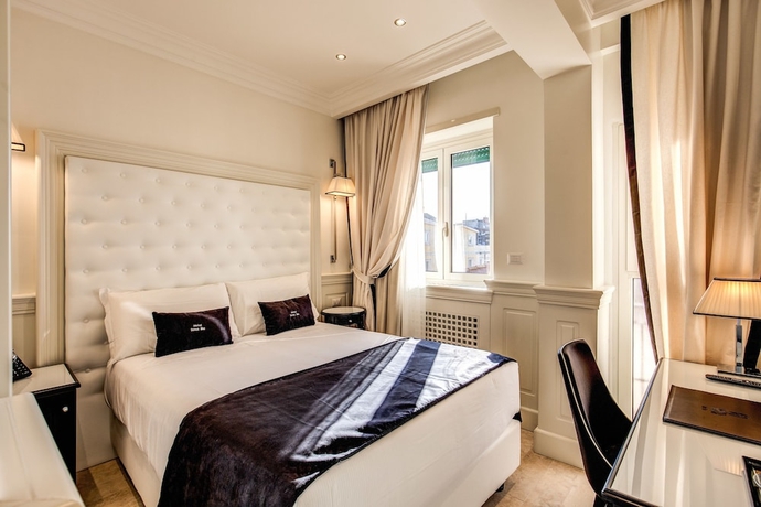 Imagen de la habitación del Hotel Domus Mea. Foto 13