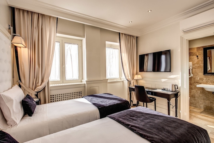 Imagen de la habitación del Hotel Domus Mea. Foto 14