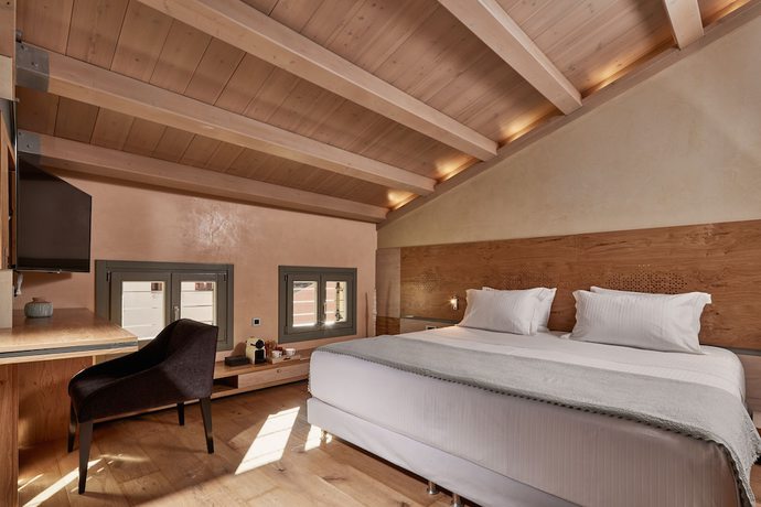 Imagen de la habitación del Hotel Domus Renier Boutique. Foto 8