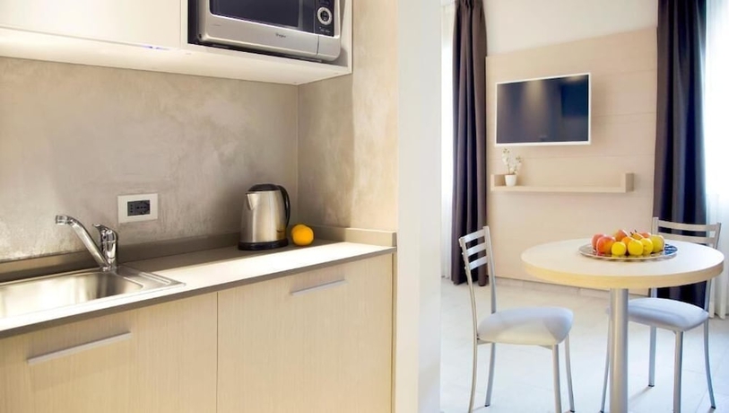 Imagen de la habitación del Hotel Domus Residence. Foto 17