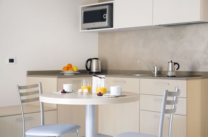 Imagen de la habitación del Hotel Domus Residence. Foto 18