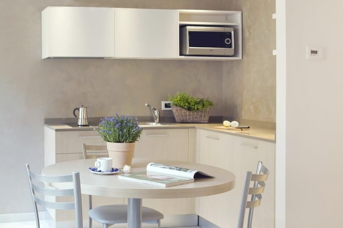 Imagen de la habitación del Hotel Domus Residence. Foto 19