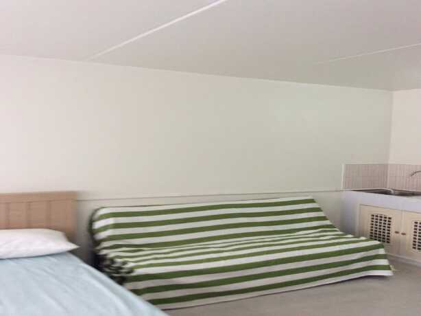 Imagen de la habitación del Hotel Don Mueang-Challenger Muangthong Thani Condominium. Foto 6