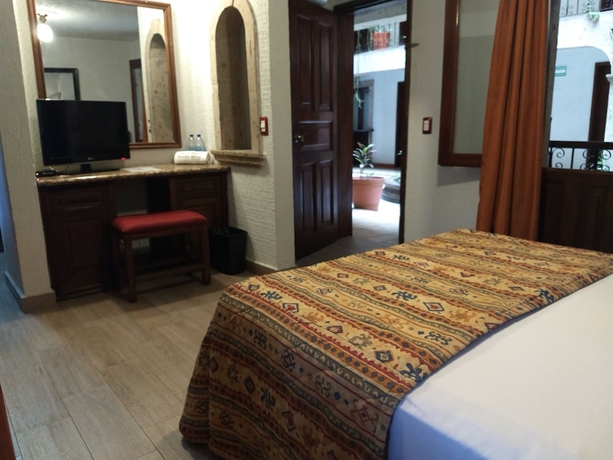 Imagen de la habitación del Hotel Don Quijote Plaza. Foto 6