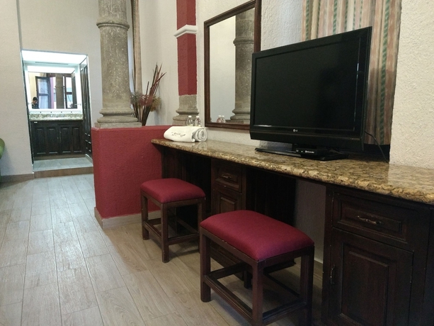 Imagen de la habitación del Hotel Don Quijote Plaza. Foto 8