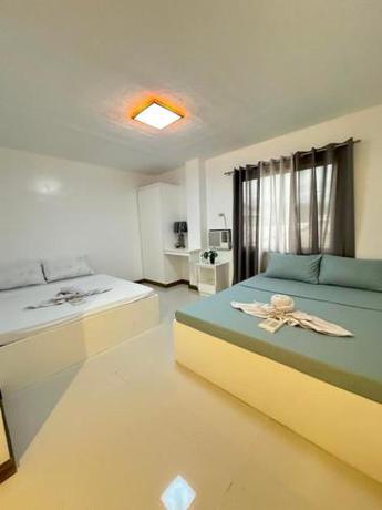 Imagen de la habitación del Hotel DonRio Siquijor. Foto 18