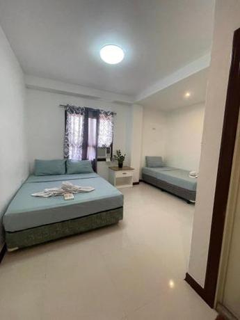 Imagen de la habitación del Hotel DonRio Siquijor. Foto 19