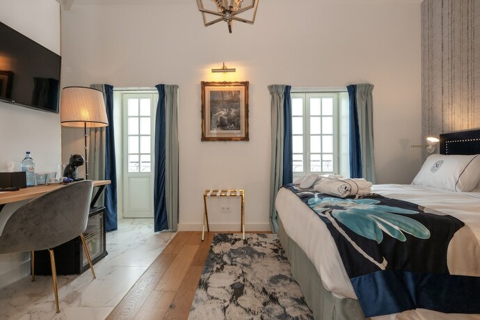 Imagen de la habitación del Hotel Dona Maria, Figueira da Foz. Foto 11