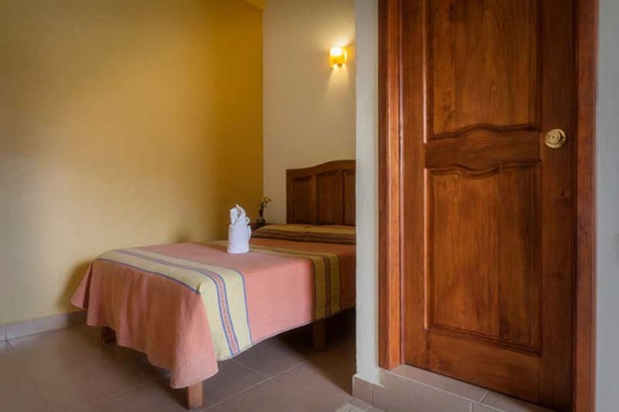 Imagen de la habitación del Hotel Donaji. Foto 7