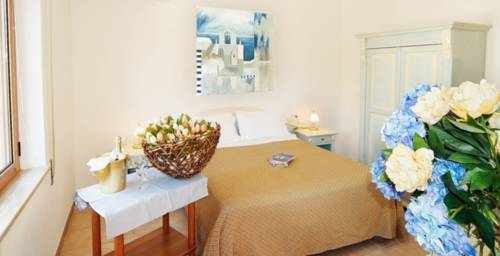 Imagen de la habitación del Hotel Donatella. Foto 14