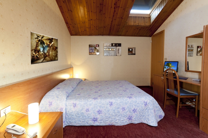 Imagen de la habitación del Hotel Donatello, Bolonia. Foto 14