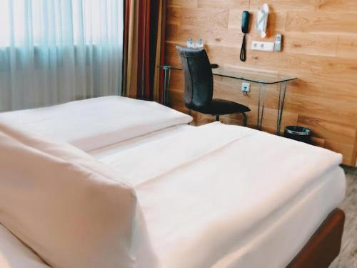 Imagen de la habitación del Hotel Donau Ingolstadt by Muniques. Foto 12