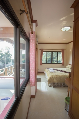 Imagen de la habitación del Hotel Donchai House. Foto 12