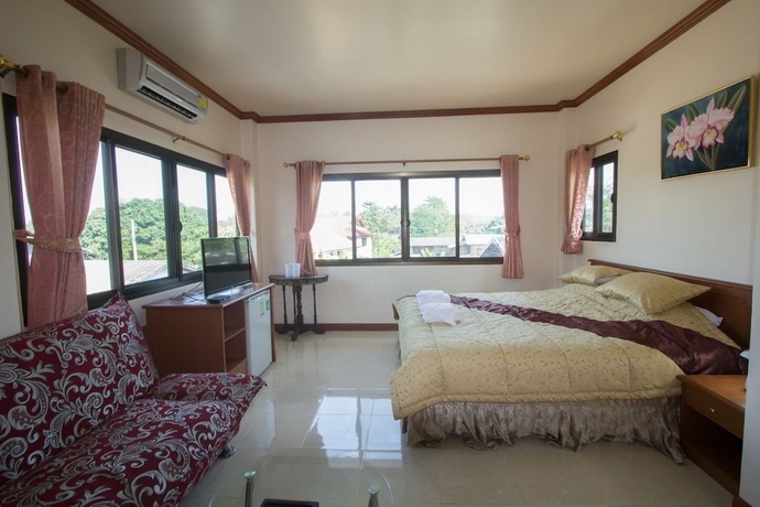 Imagen de la habitación del Hotel Donchai House. Foto 15