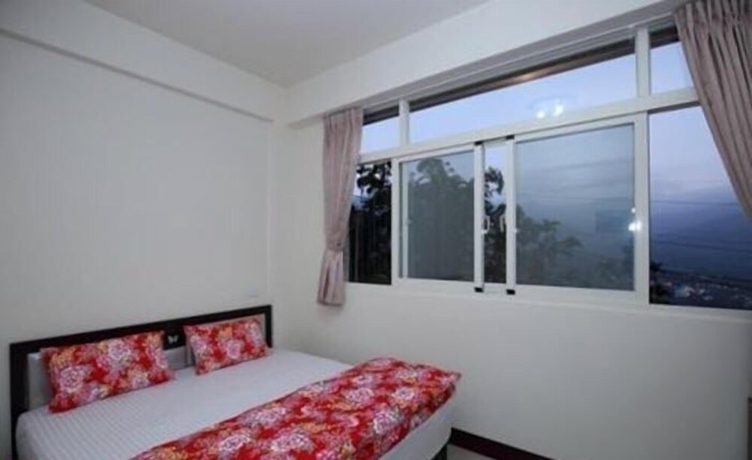 Imagen de la habitación del Hotel Dong Ding Homestay. Foto 10