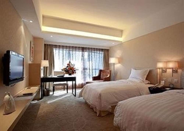 Imagen de la habitación del Hotel Dong Huang. Foto 5