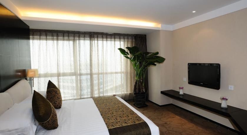 Imagen de la habitación del Hotel Dong Huang. Foto 8