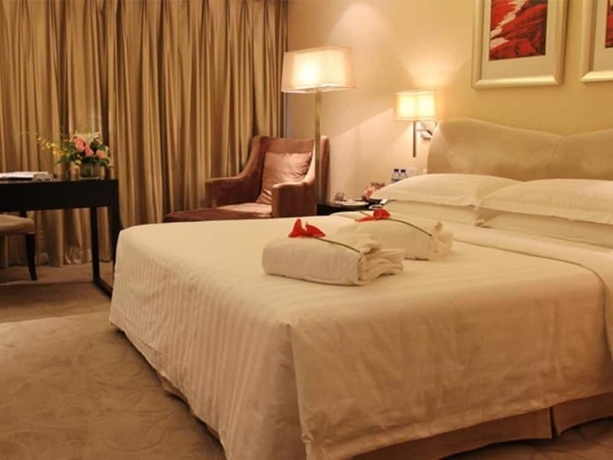 Imagen de la habitación del Hotel Dong Huang. Foto 10