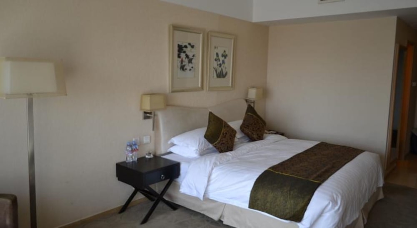 Imagen de la habitación del Hotel Dong Huang. Foto 13