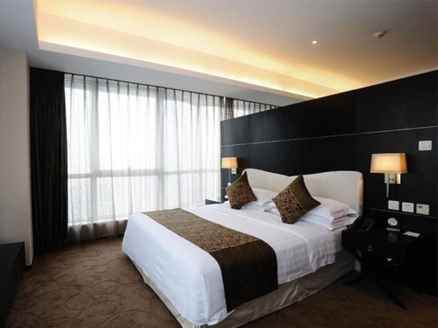 Imagen de la habitación del Hotel Dong Huang. Foto 15