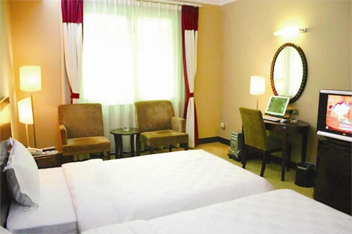 Imagen de la habitación del Hotel Dong Shan Hotel - Guangzhou. Foto 4