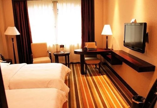 Imagen de la habitación del Hotel Dong Shan Hotel - Guangzhou. Foto 15