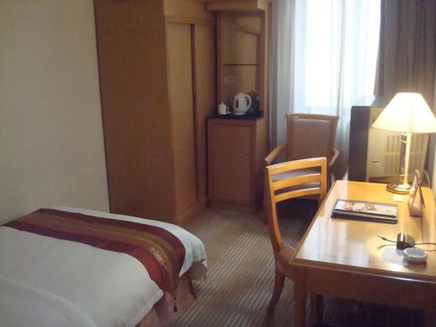 Imagen de la habitación del Hotel Dong Shan Hotel - Guangzhou. Foto 18