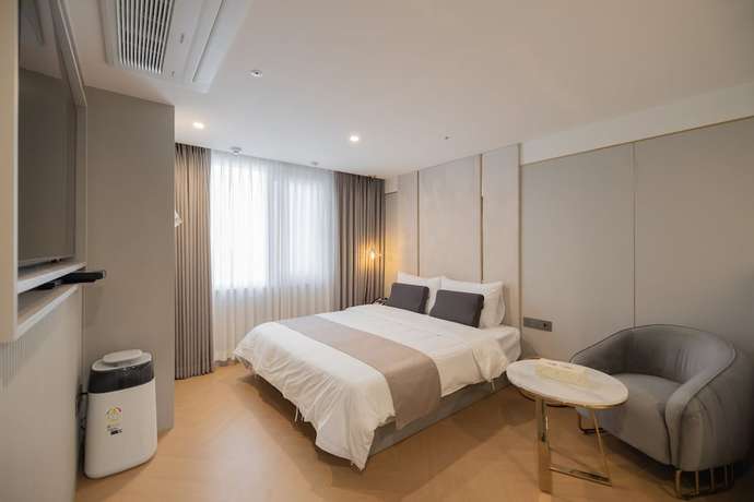 Imagen de la habitación del Hotel DongRae Denbasta. Foto 5