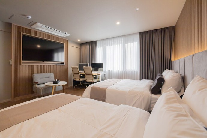 Imagen de la habitación del Hotel DongRae Denbasta. Foto 6