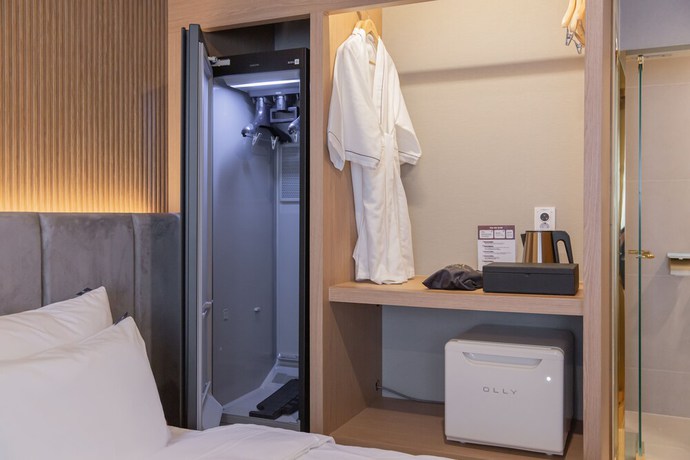 Imagen de la habitación del Hotel DongRae Denbasta. Foto 12