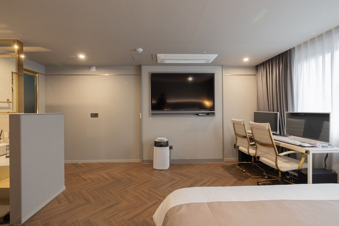 Imagen de la habitación del Hotel DongRae Denbasta. Foto 13