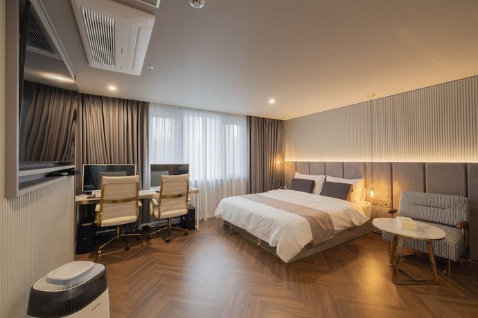 Imagen de la habitación del Hotel DongRae Denbasta. Foto 15