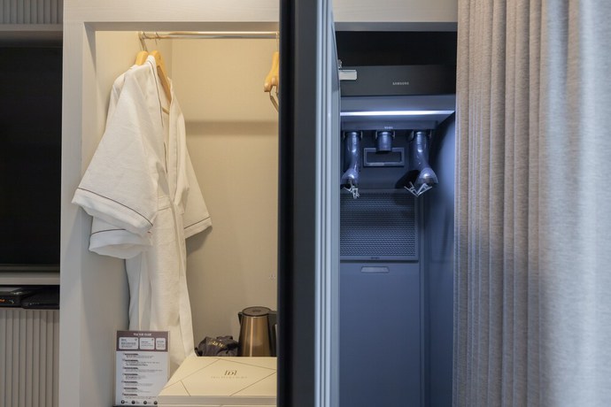 Imagen de la habitación del Hotel DongRae Denbasta. Foto 16