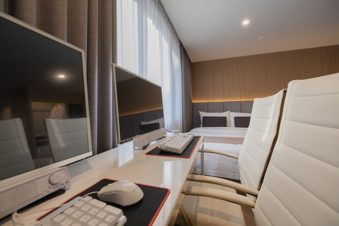 Imagen de la habitación del Hotel DongRae Denbasta. Foto 17