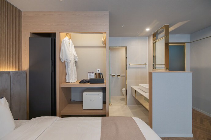 Imagen de la habitación del Hotel DongRae Denbasta. Foto 18