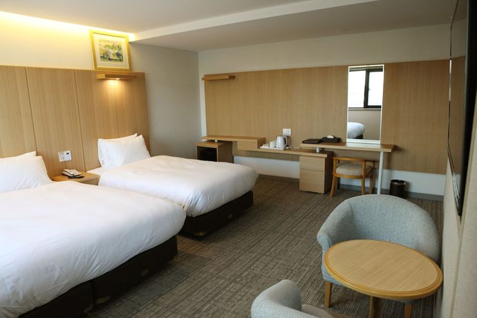 Imagen de la habitación del Hotel Dongbang. Foto 6
