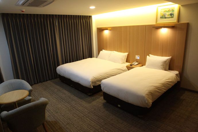 Imagen de la habitación del Hotel Dongbang. Foto 15