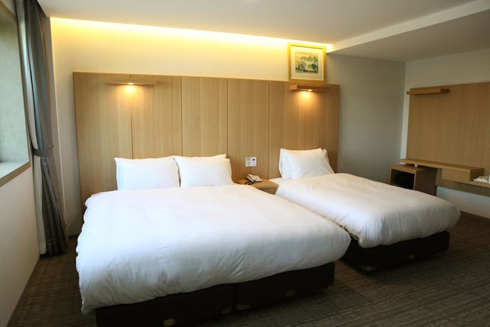 Imagen de la habitación del Hotel Dongbang. Foto 16
