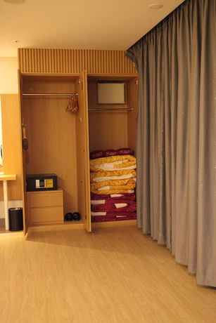 Imagen de la habitación del Hotel Dongbang. Foto 19