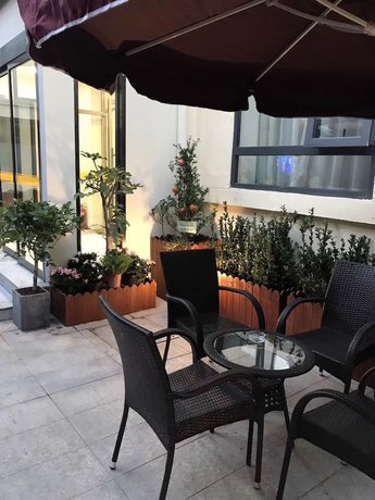 Imagen de la habitación del Hotel Dongdan Beijing. Foto 4