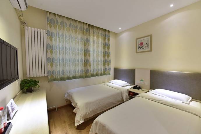 Imagen de la habitación del Hotel Dongdan Beijing. Foto 13