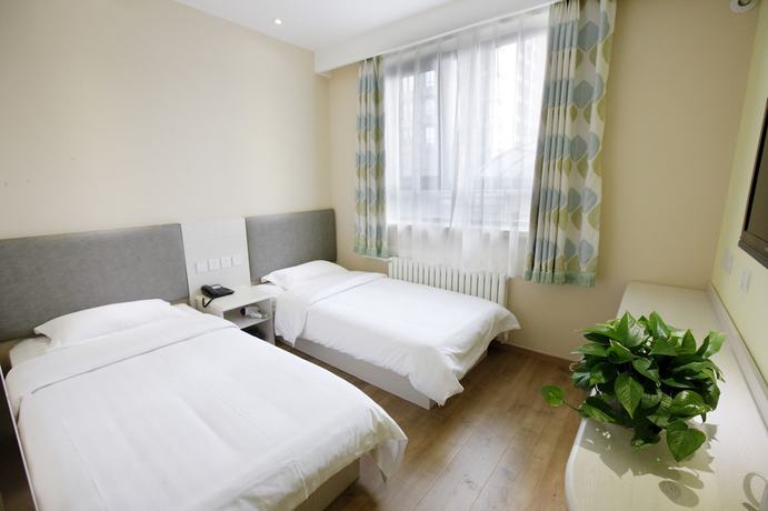 Imagen de la habitación del Hotel Dongdan Beijing. Foto 16