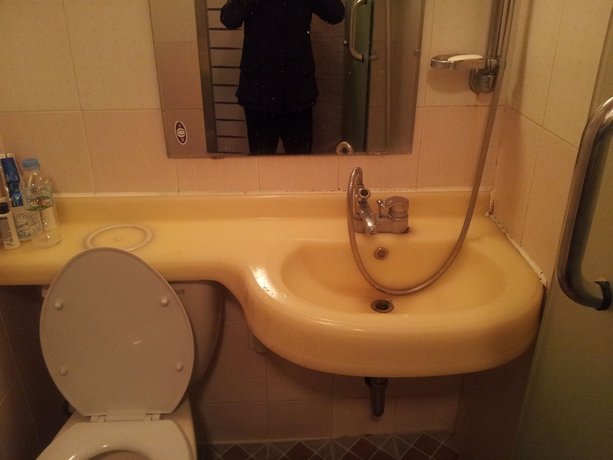 Imagen de la habitación del Hotel Dongdo. Foto 4