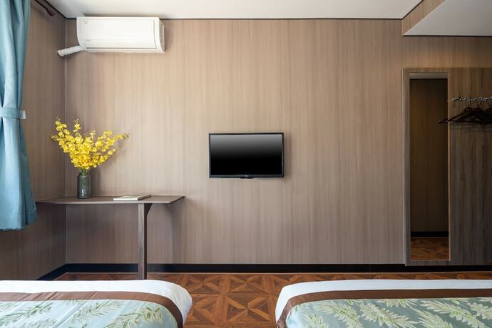 Imagen de la habitación del Hotel Dongfang Shengda Cultural. Foto 14