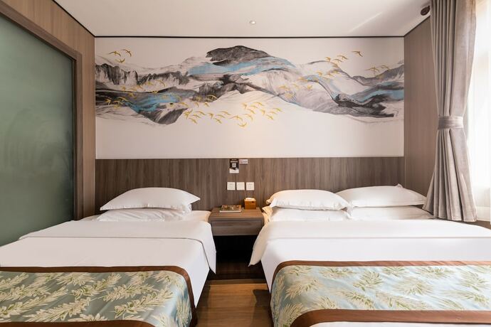 Imagen de la habitación del Hotel Dongfang Shengda Cultural. Foto 15