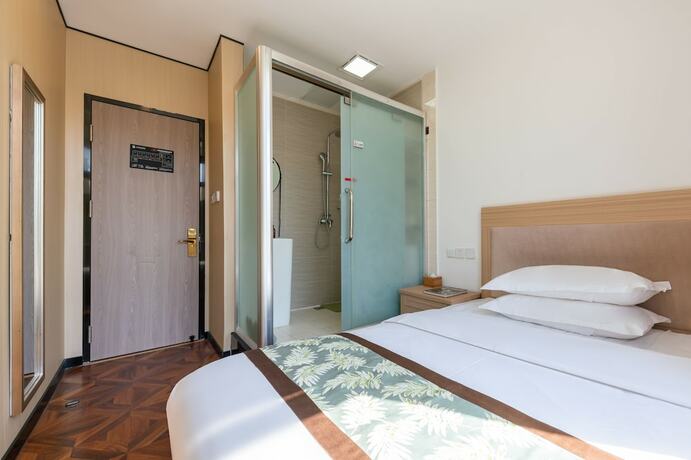 Imagen de la habitación del Hotel Dongfang Shengda Cultural. Foto 16