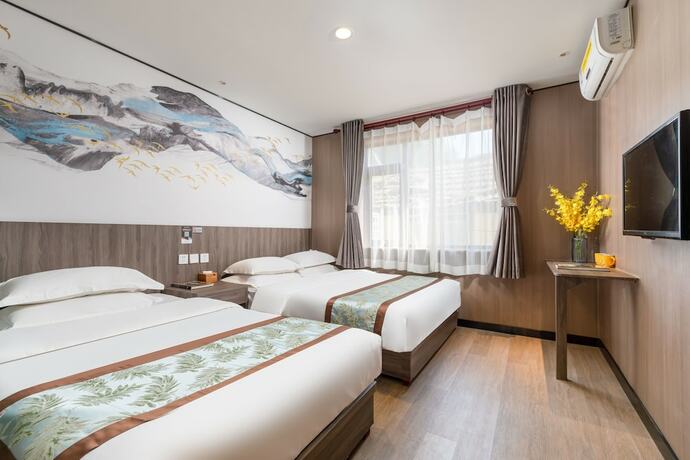 Imagen de la habitación del Hotel Dongfang Shengda Cultural. Foto 17