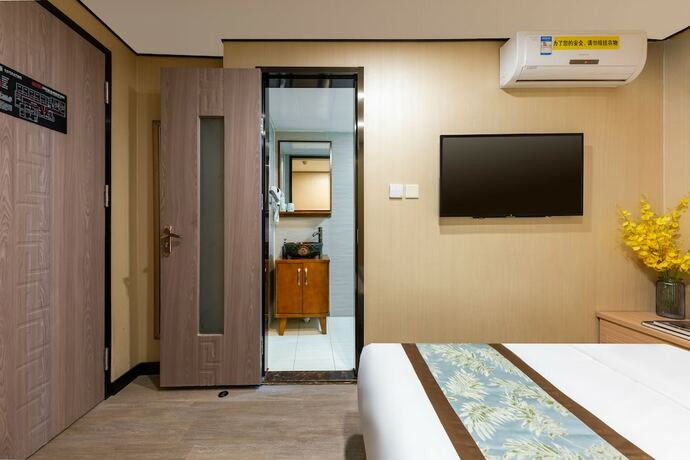 Imagen de la habitación del Hotel Dongfang Shengda Cultural. Foto 20
