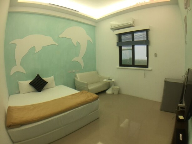 Imagen de la habitación del Hotel Donggang Neptune Hall. Foto 21